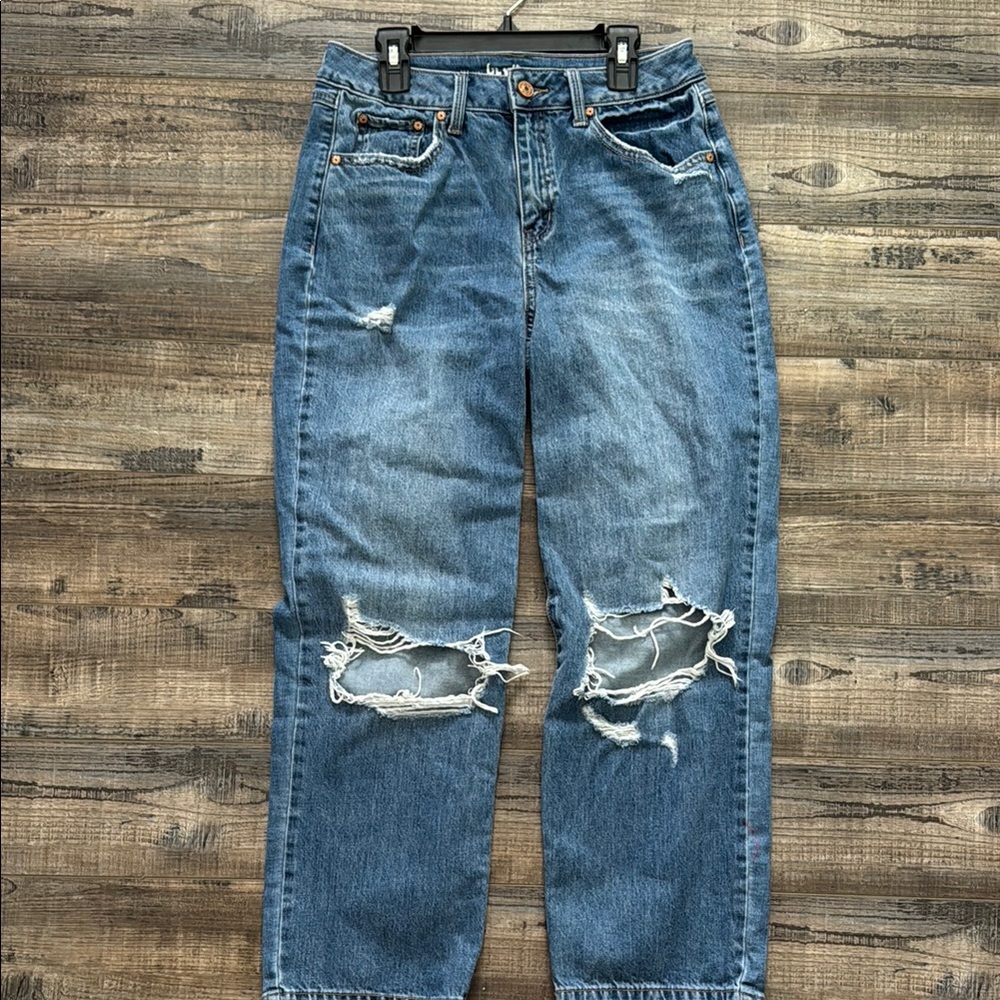 Distressed Blue Jeans